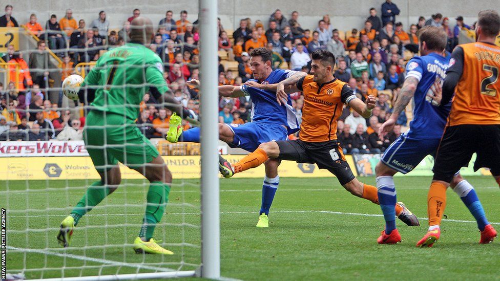 Defender Sean Morrison goes close for Cardiff City in their Championship game at Wolves.