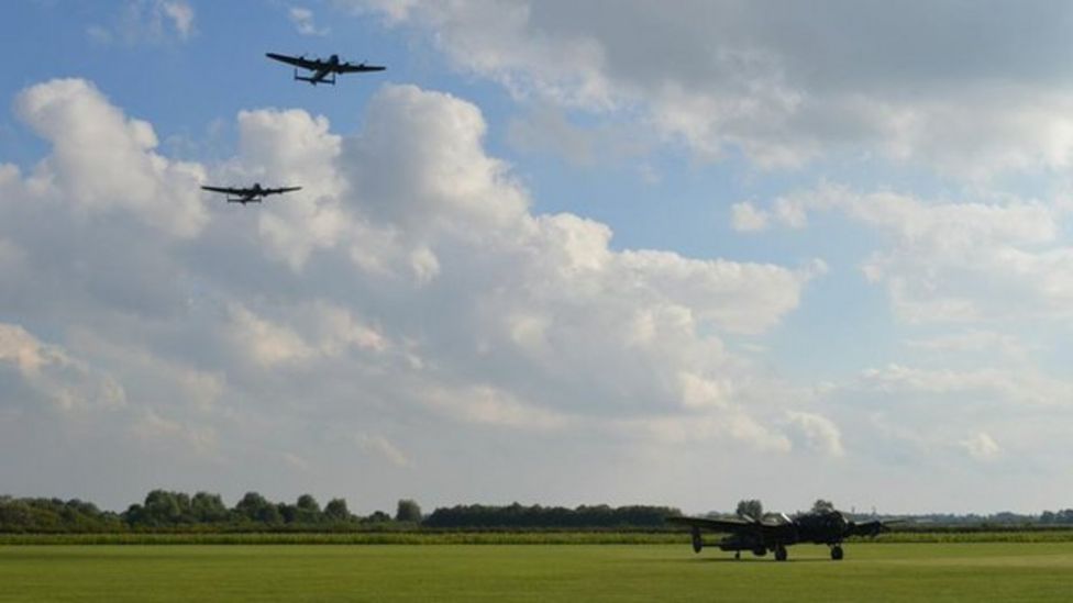 Two Lancasters fly together for the last time - BBC News