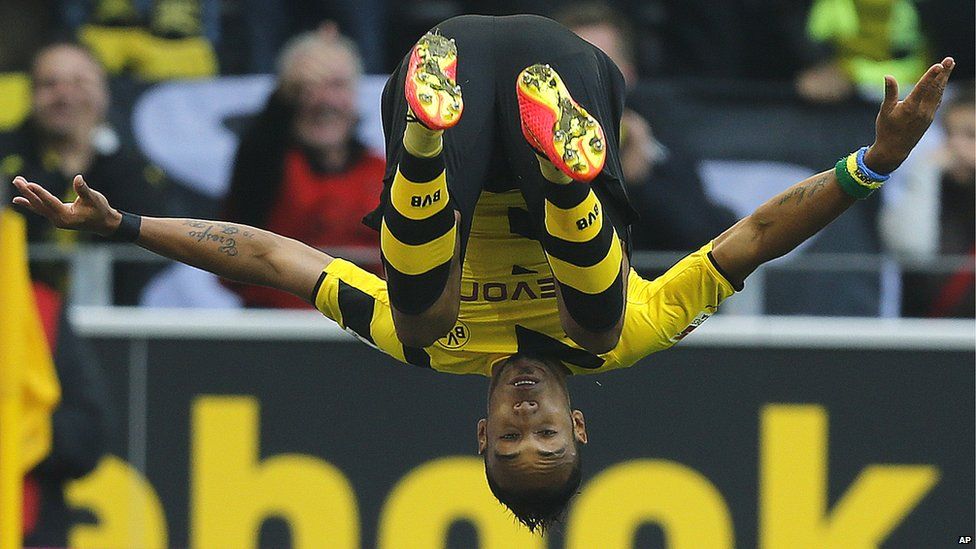 Borussia Dortmund player Pierre-Emerick Aubameyang somersaulting after scoring in Dortmund, Germany - Saturday 13 September 2014
