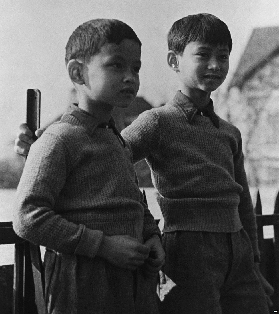 Thailand's Prince Bhumibol (left) now King Bhumibol Adulyadej with his brother Prince Ananda, the former King Ananada Mahidol, in the grounds of the school in Lausanne Switzerland, on March 1935