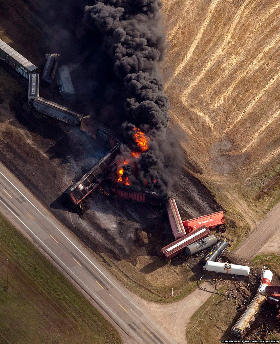 A Canadian National Railway Company freight train is on fire following derailment