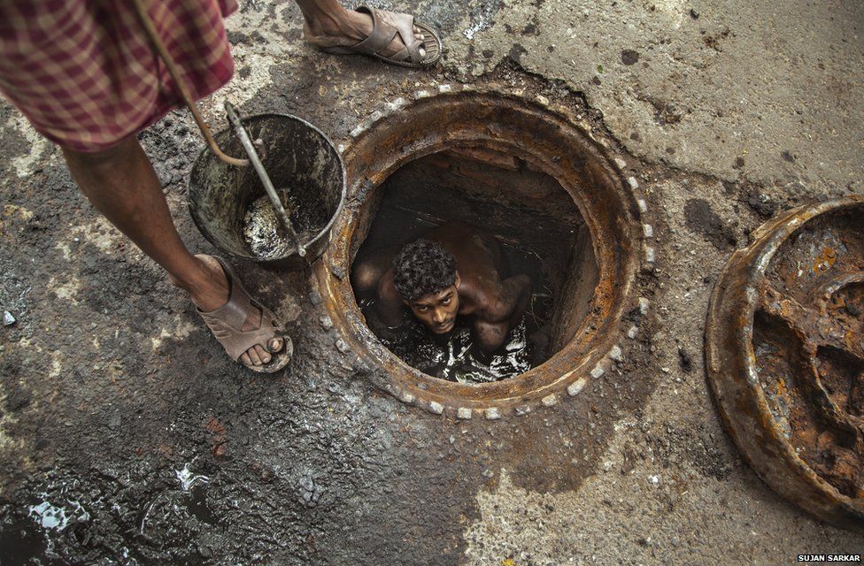 Sewage worker in India