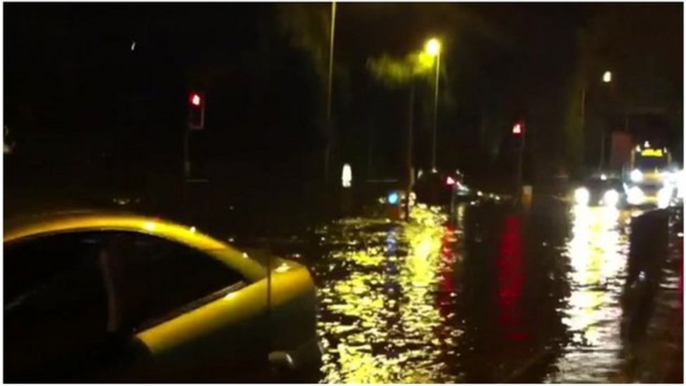 Exeter flooding sees elderly people evacuated from homes - BBC News