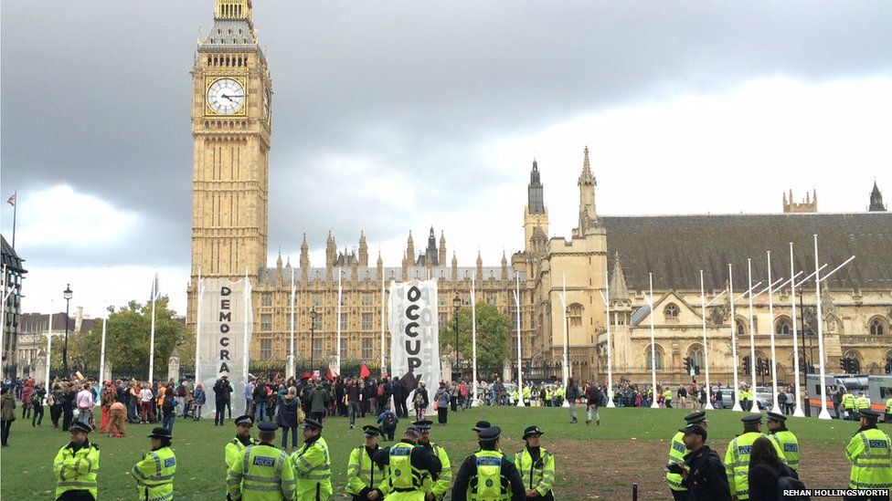 Occupy protestors outside the Houses of Parliament