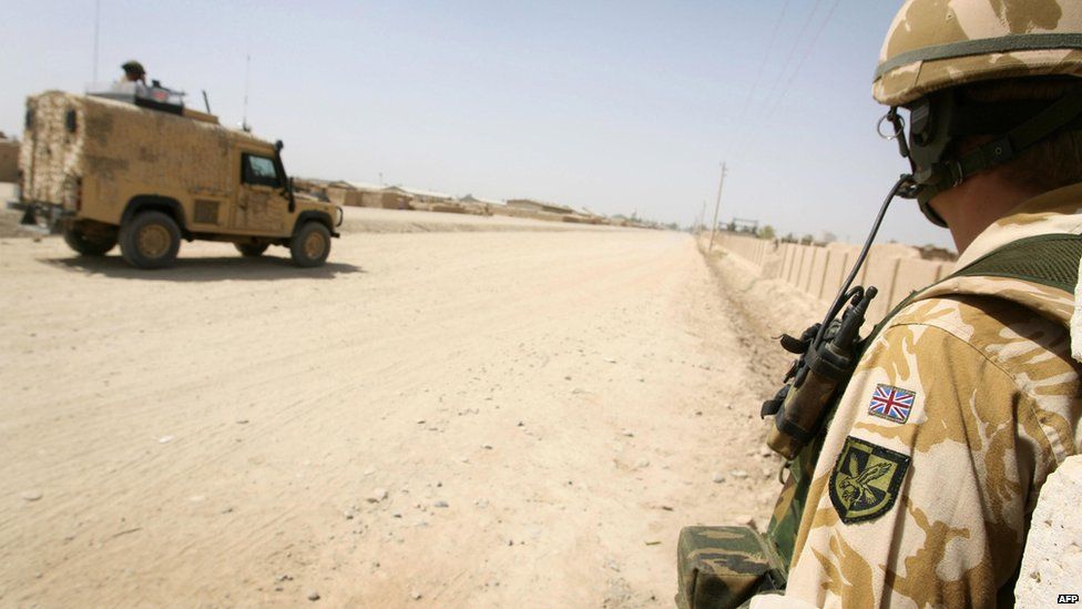 Soldiers from 16 Air Assault Brigade, on foot and using Snatch Land Rover vehicles in Lashkar Gah