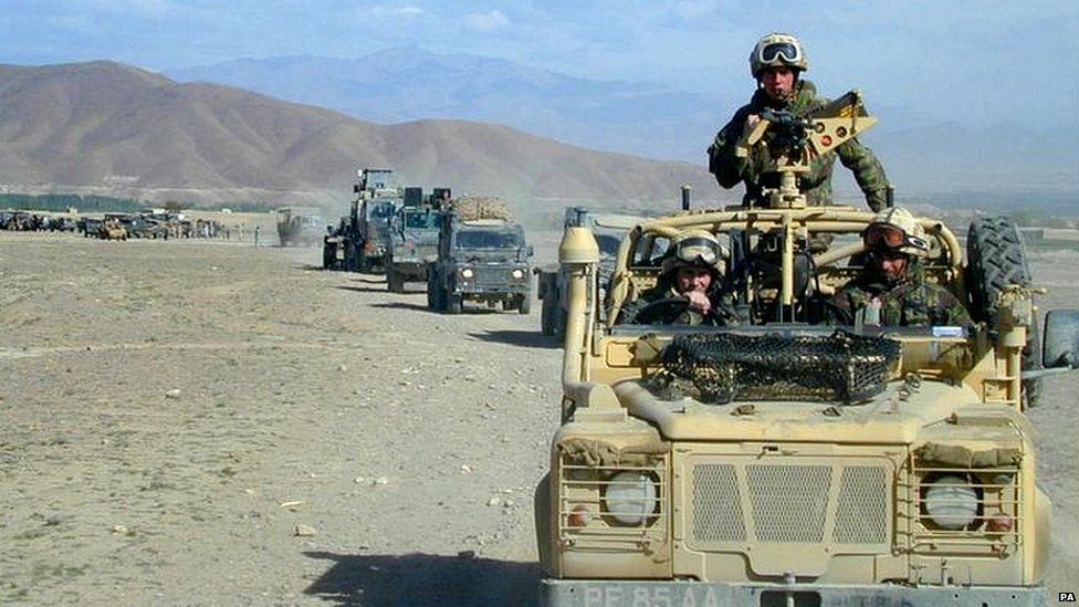 Convoy from 45 Commando Royal Marines makes its way through the Afghan countryside during Operation Snipe in the south east region of Afghanistan in May 2002