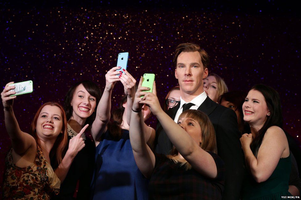 Fans take selfies with the new wax figure of Sherlock star Benedict Cumberbatch