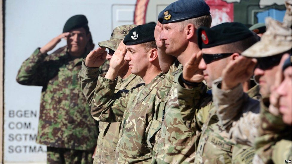 British troops lined up saluting