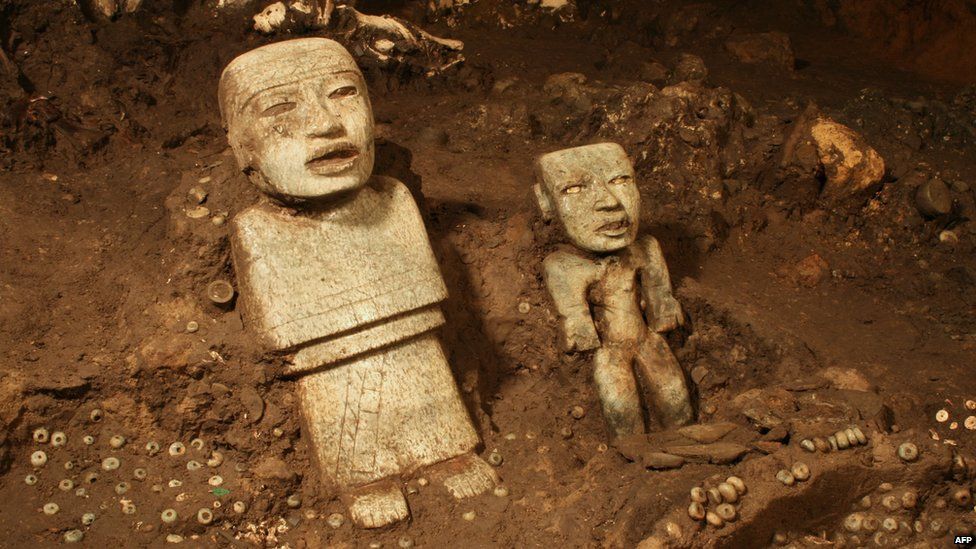 Handout picture released by the National Institute of Anthropology and History (INAH in Spanish) showing stone sculptures found at the Temple of the Feathered Serpent (Serpiente Emplumada) at the Teotihuacan complex in Mexico City, taken on November 19, 2013.