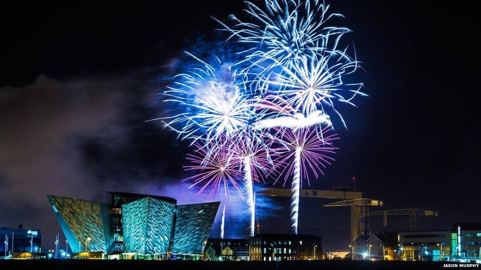 Fireworks illuminating the night sky at Titanic Quarter in Belfast