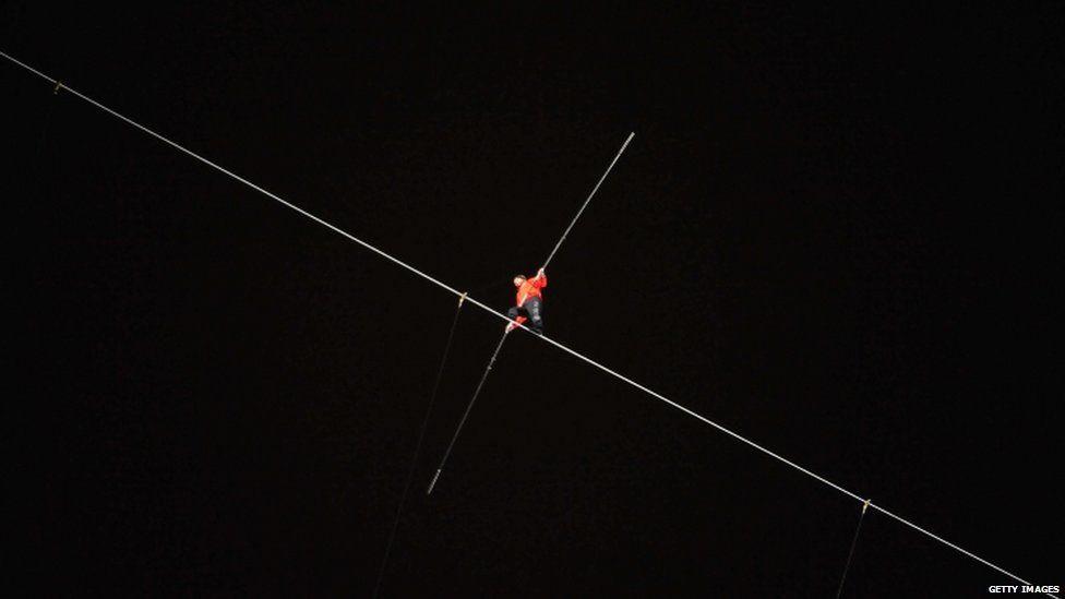 Nik Wallenda walks on a wire