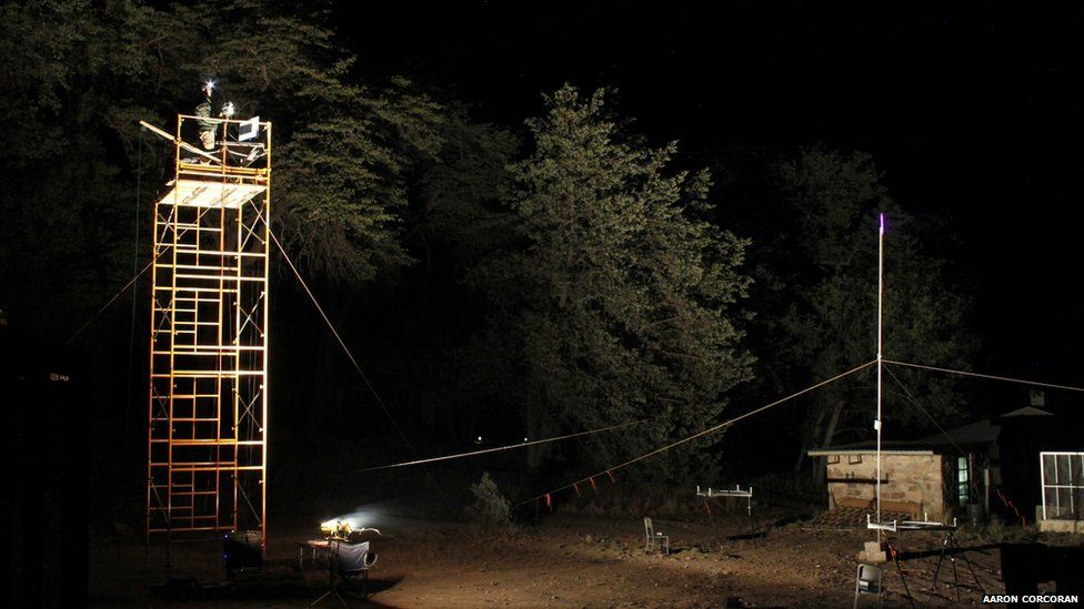 Foraging bats were attracted to this field location with the ultraviolet light tower seen in the right of the image, and the bat sounds were recorded on two microphone arrays placed below the light