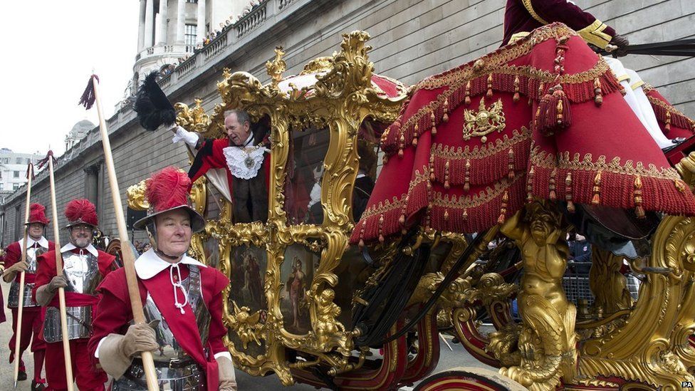Alan Yarrow, the new Lord Mayor waves to the crowds during the Lord Mayor"s Show in the City of London.
