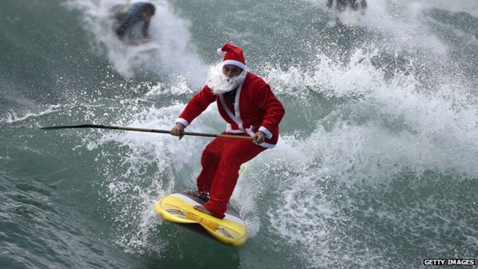 Caption Challenge: Surfing Santa - BBC News