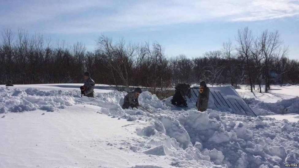 Members of the National Guard have been drafted in to help clear the heavy snow.
