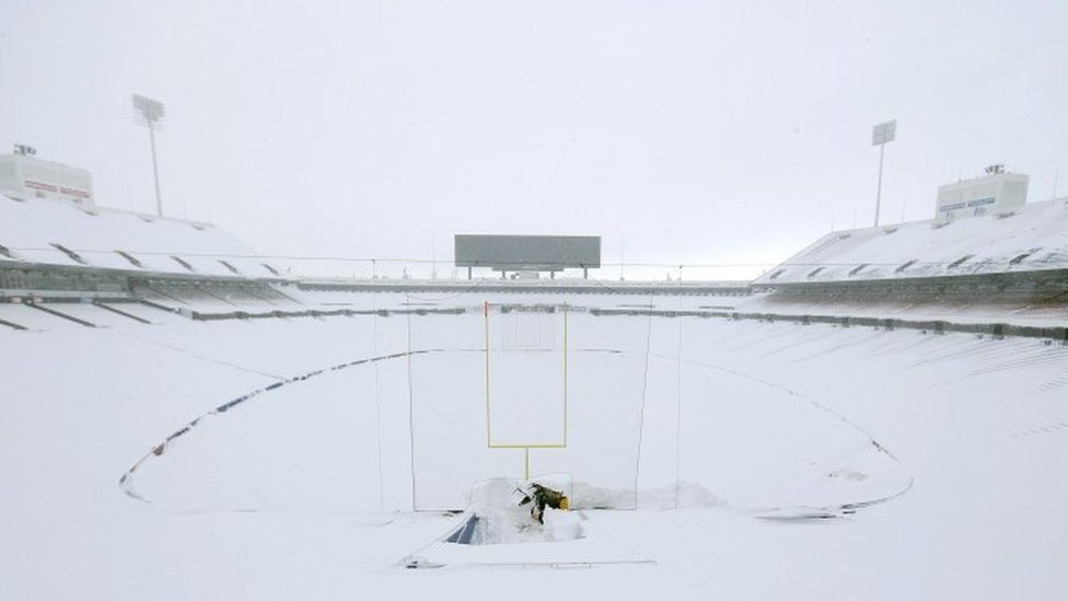 The scene in a football stadium in New York State after the snowfall