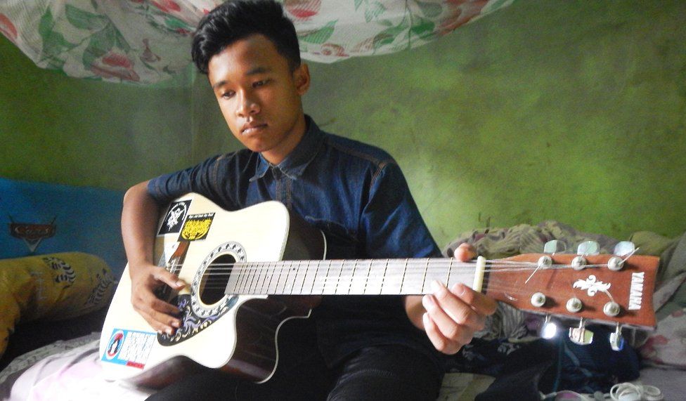 Brother with guitar