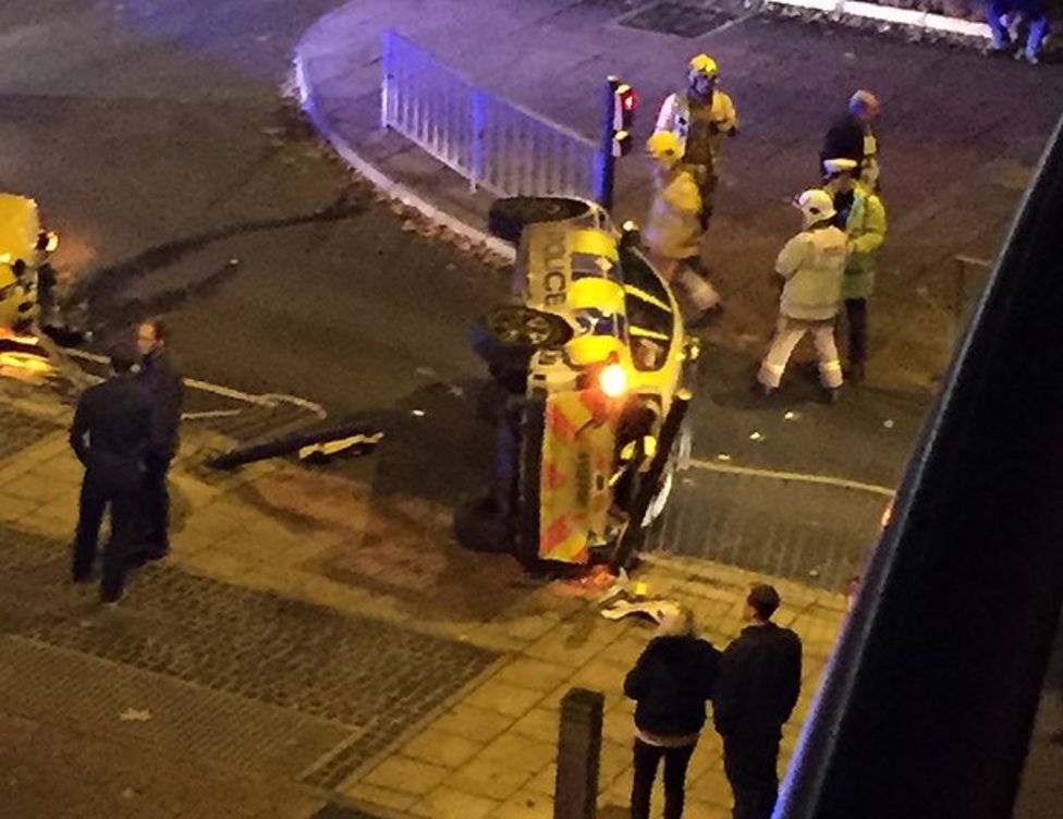 Norfolk Police car flips on side in Norwich car crash BBC News