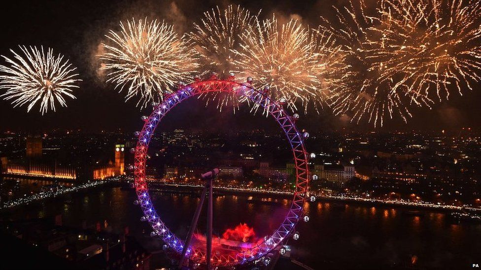 Fireworks explode over London on 1 January 2015
