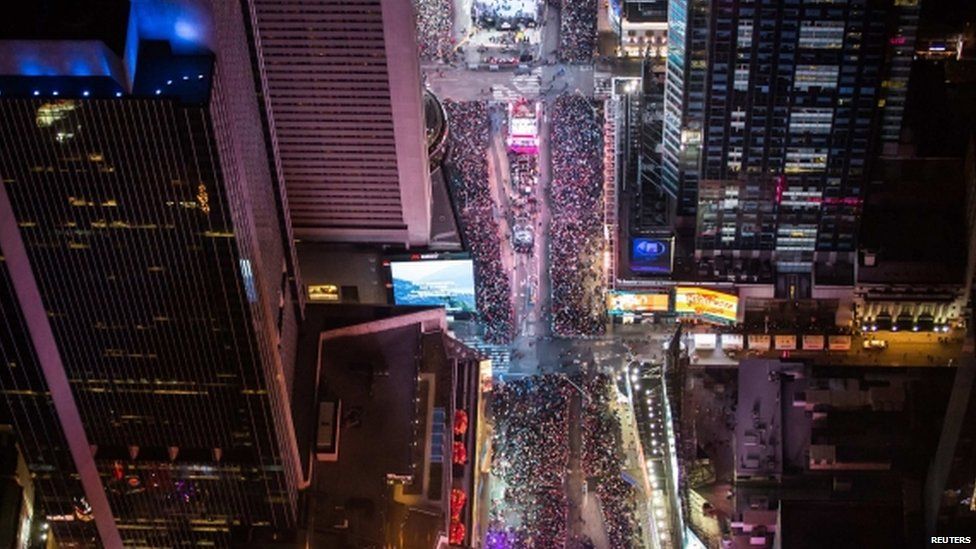 In this aerial image over Midtown, Manhattan, revellers are seen taking part in New Year"s Eve celebrations in Times Square (01 January 2015)