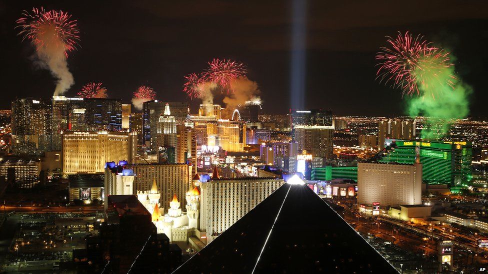 Fireworks explode above the Strip to ring in the new year on 1 January 2015, in Las Vegas
