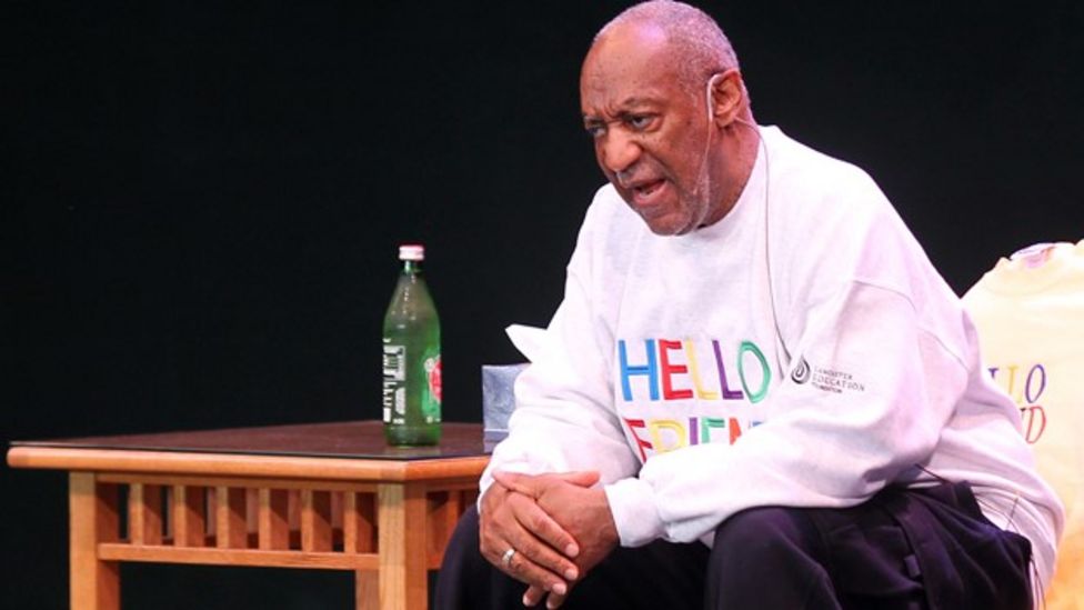 Bill Cosby receives standing ovation despite protests BBC News