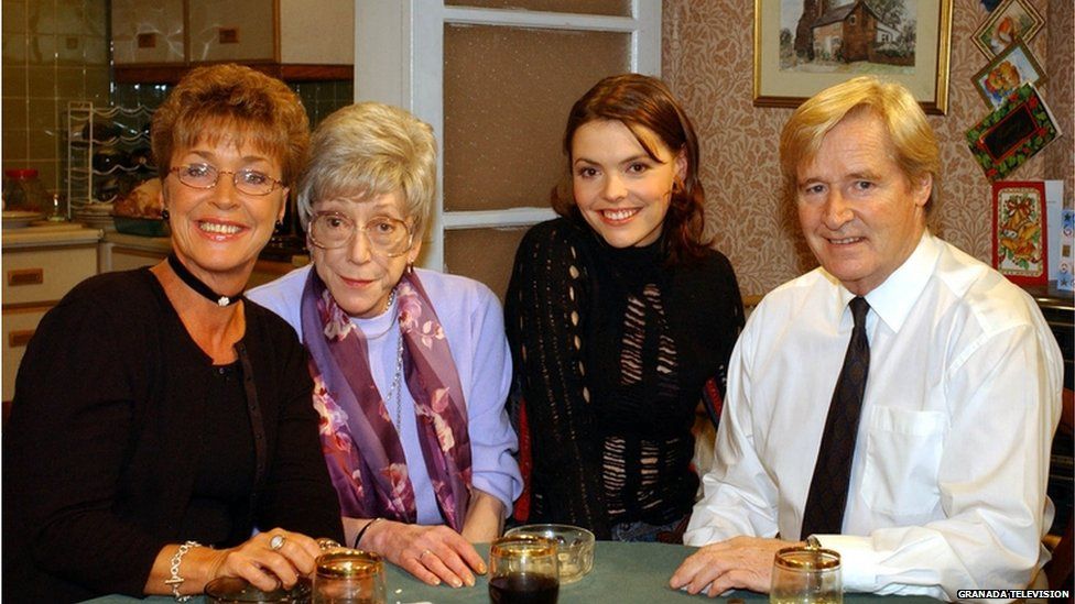 Anne Kirkbride with her on-screen family