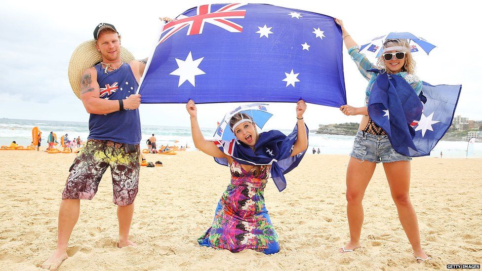 Beachgoers pose on Bondi beach as part of the 2014 Australia Day Celebrations on January 26, 2014 in Sydney, Australia.