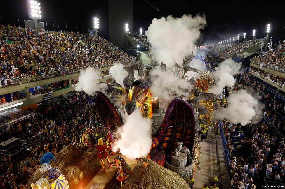 Performers from the Unidos da Tijuca samba school parade during carnival celebrations at the Sambadrome in Rio de Janeiro, Brazil