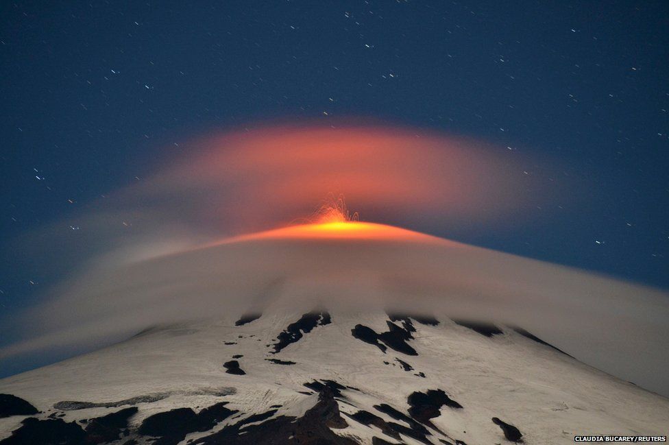 Smoke and lava spew from the Villarrica volcano
