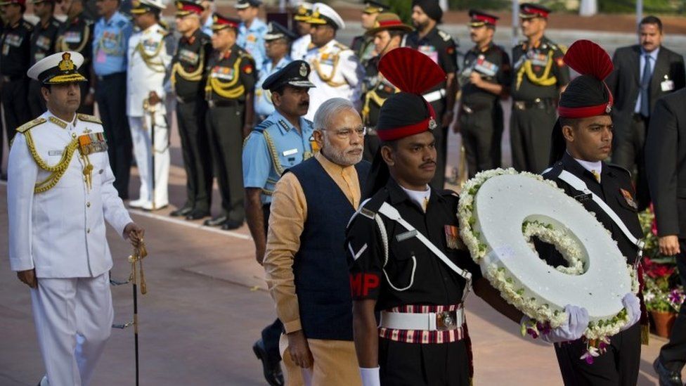 PM Narendra Modi arrives to pay homage at a World War I memorial at India Gate in Delhi March 10, 2015.