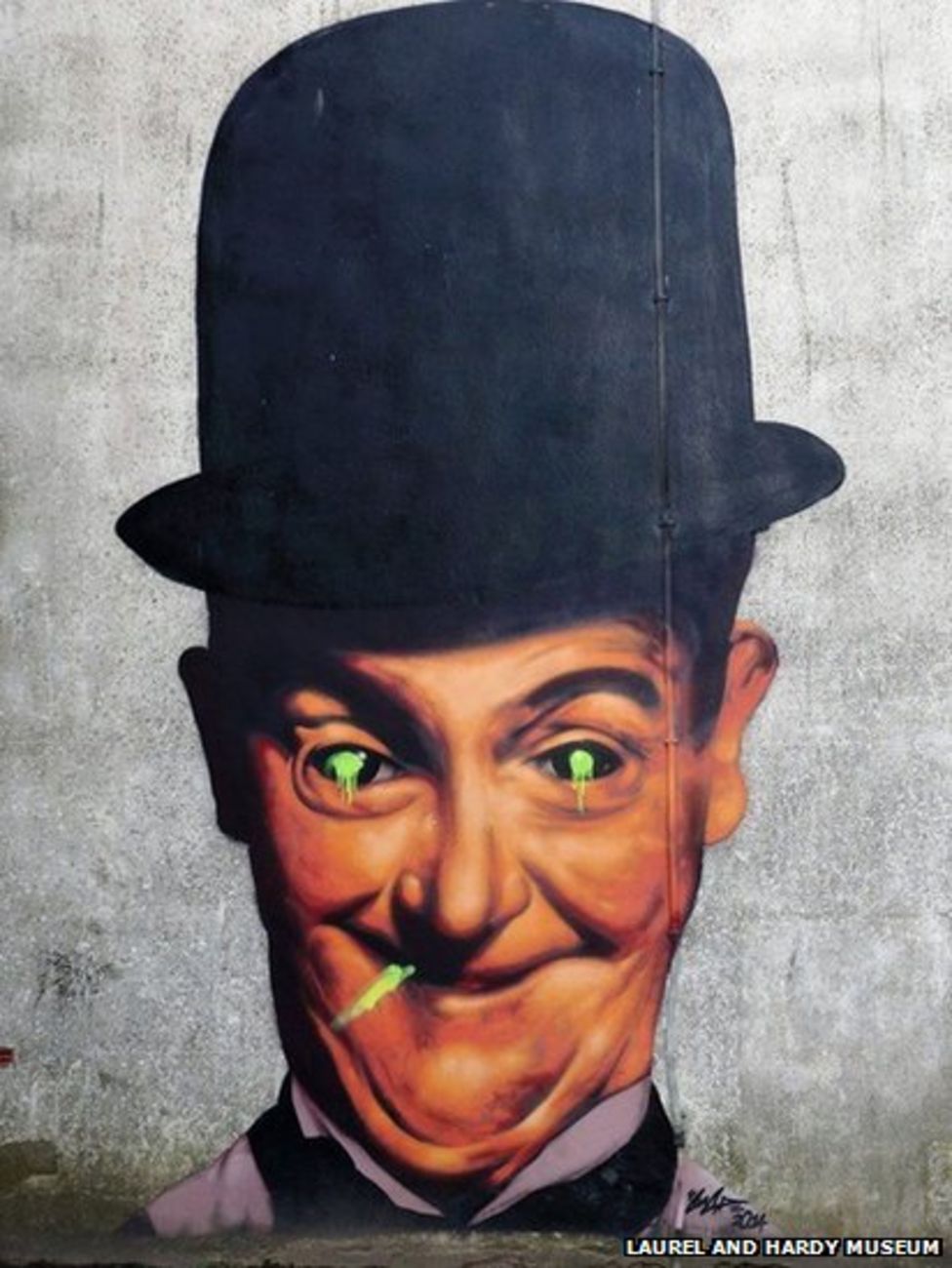 Stan Laurel painting in Ulverston defaced by vandals BBC News
