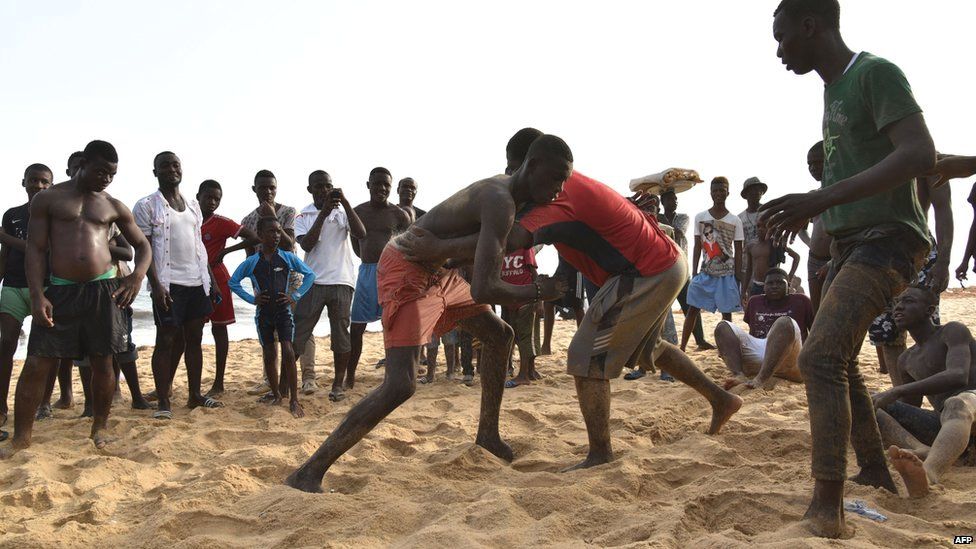 Beach wrestling match in Grand Bassam, Ivory Coast - - Saturday 18 April 2015