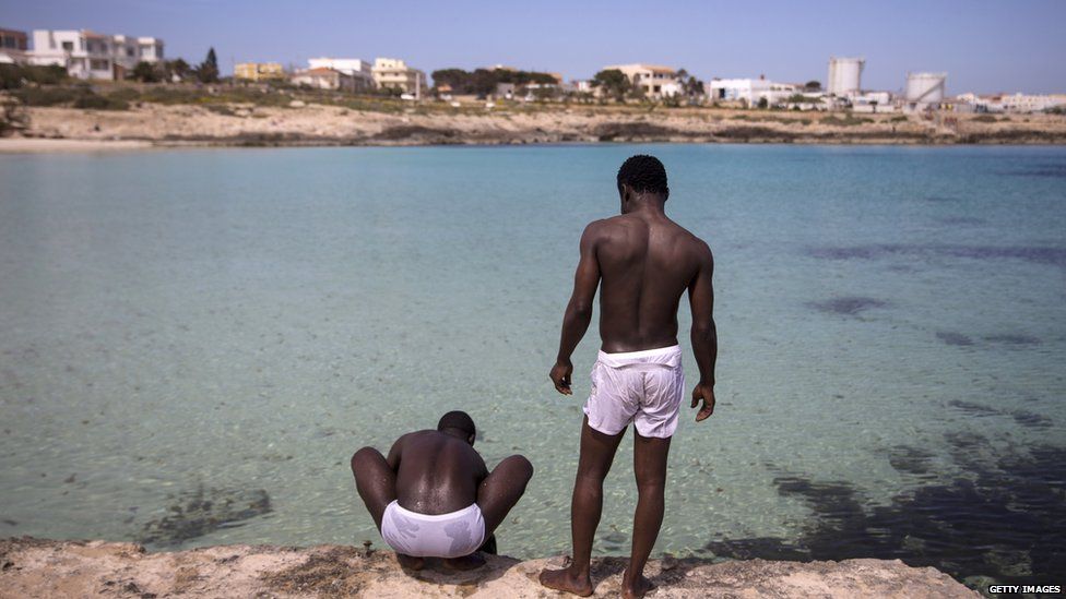 Two Nigerians by the sea in Lampedusa, Italy - Wednesday 22 April 2015
