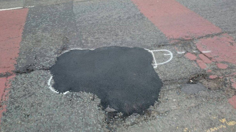 A filled-in pothole