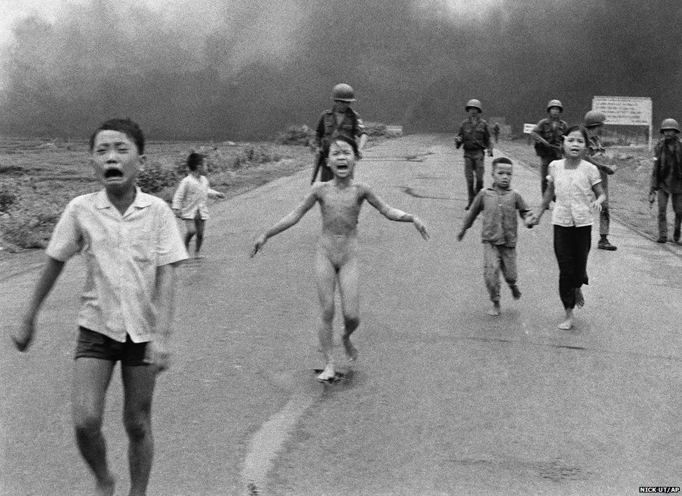 Vietnamese children fleeing a napalm attack