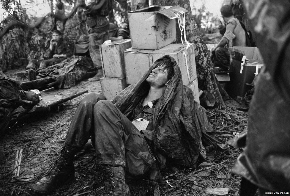 A US paratrooper wounded in the battle for Hamburger Hill awaits medical evacuation at base camp near the Laotian border on 19 May 1969