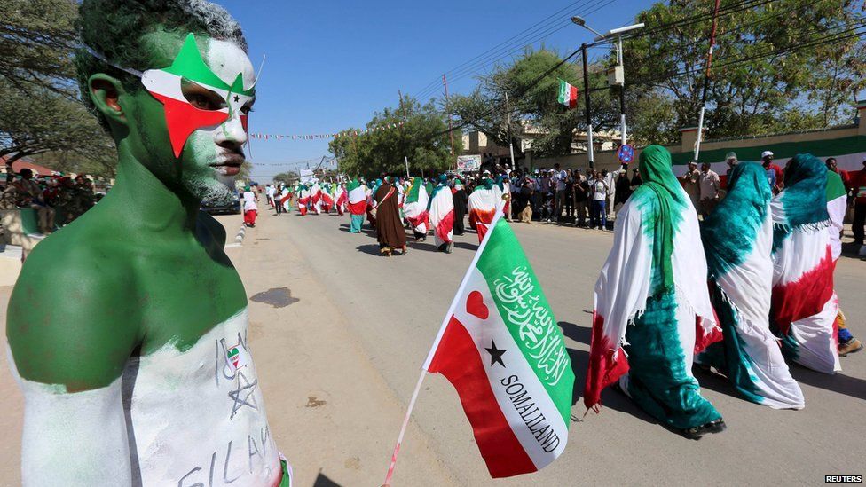 A man with body paint in the colours of the national flag participates in a street parade to celebrate the 24th self-declared independence day for the breakaway Somaliland nation from Somalia in capital Hargeisa - 18 May 2015