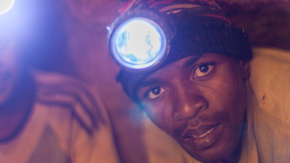 Miners working on a sapphire mine in Madagascar