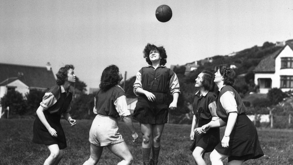 Women-playing-football-old-BW-Image