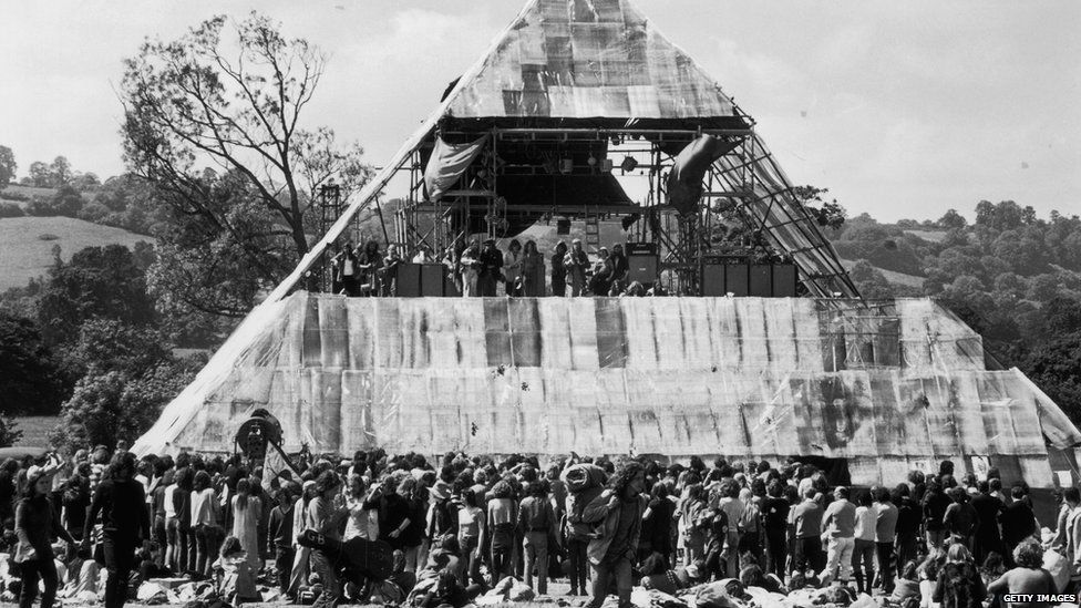 People crowding around the Pyramid Stage