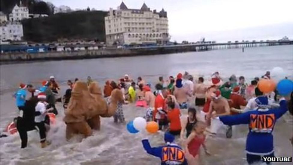 Skinny dippers at Llandudno charity swim in 'bad taste' BBC News