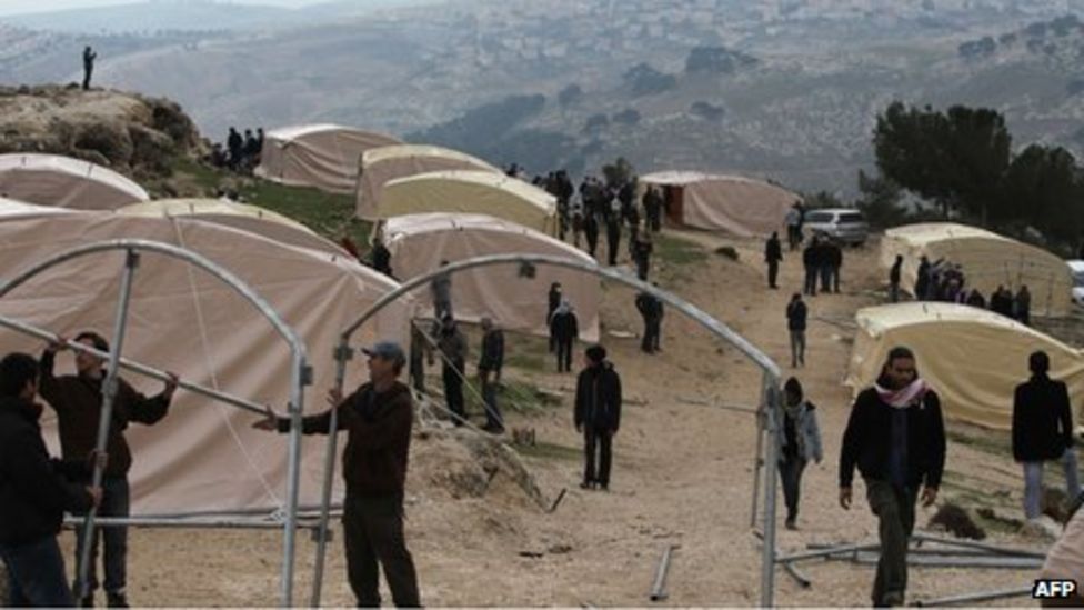 Palestinian protest on land assigned for E1 settlement - BBC News