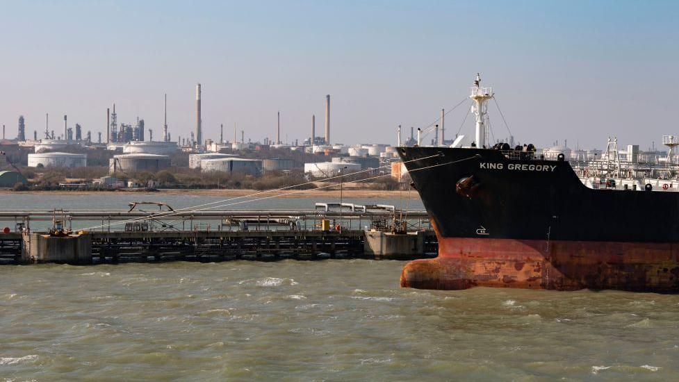 Fawley, Southampton, England, UK, Chemical oil products tanker ship discharging cargo at Fawley oil refinery on Southampton Water