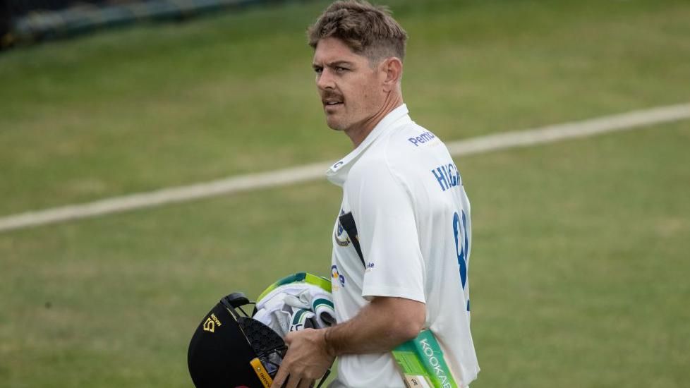 Daniel Hughes walks off at the end of his innings