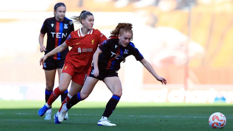 Annabel Blanchard running with the ball for Crystal Palace against Liverpool