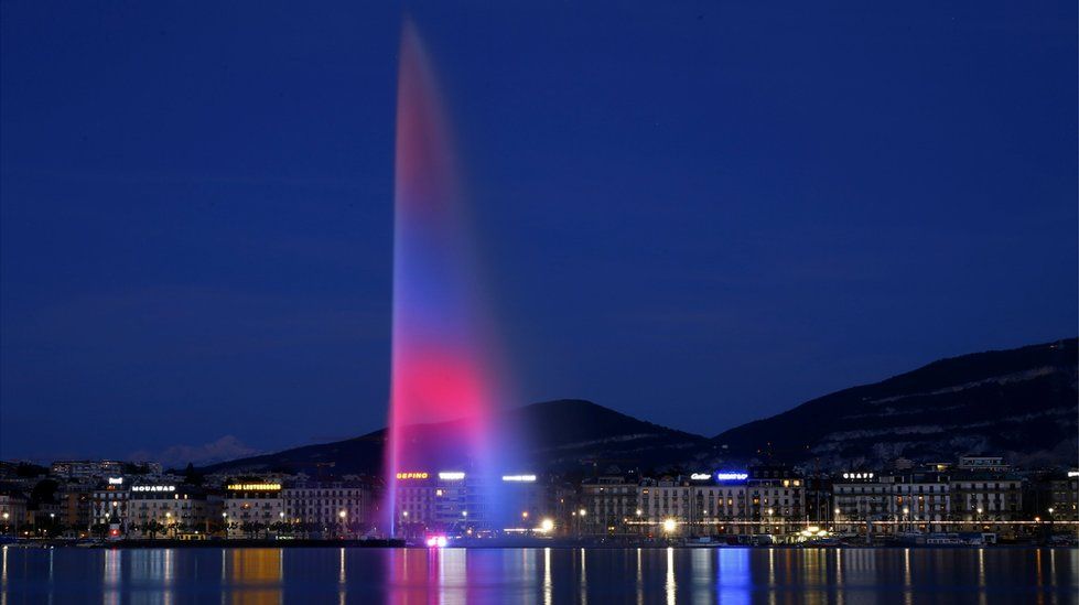 The water fountain (jet d"eau) is lit with blue, red and white in remembrance for the victims of an attack on concert goers at Manchester Arena, in Geneva, Switzerland, May 23, 2017