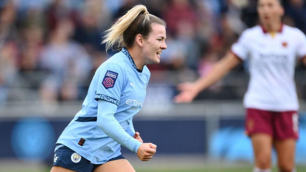 Lauren Hemp celebrates scoring for Manchester City