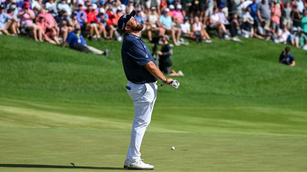 Lowry reacts to his missed putt on the 18th green at Valhalla