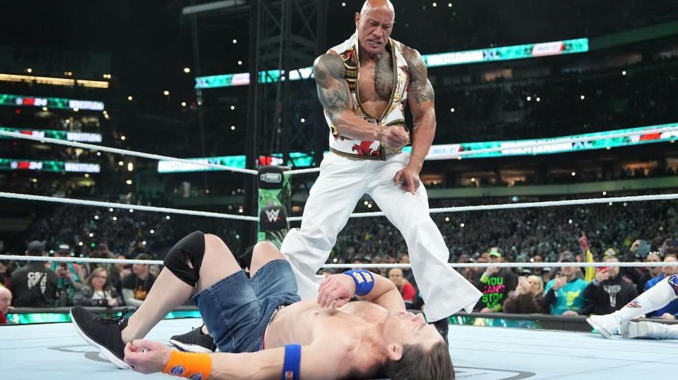 The Rock fights against John Cena on Night Two at WrestleMania 40 at Lincoln Financial Field on April 7, 2024 in Philadelphia, Pennsylvania